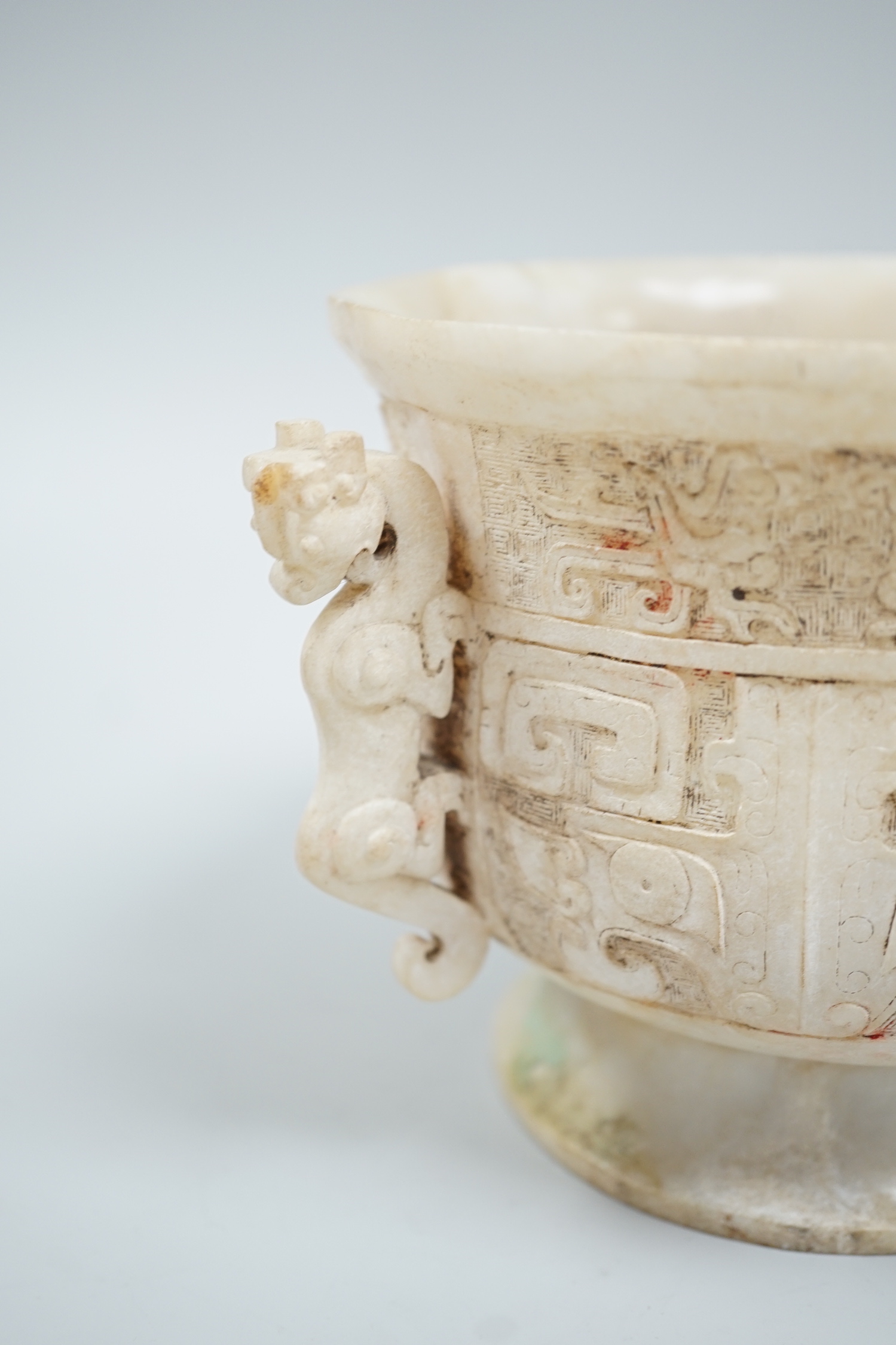 A Chinese burnt jade or hardstone censer, a stone cup and a doucai stem cup, censor 12cm high